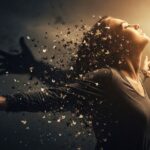 Powerful visual of person breaking free from anxiety chains transforming into light and butterflies