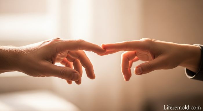 Hands connecting showing compassion and understanding