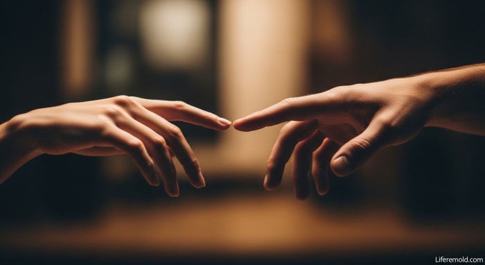 Two hands reaching toward each other symbolizing desire to reconnect