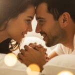 Romantic couple lying in bed face-to-face having intimate conversation before sleep