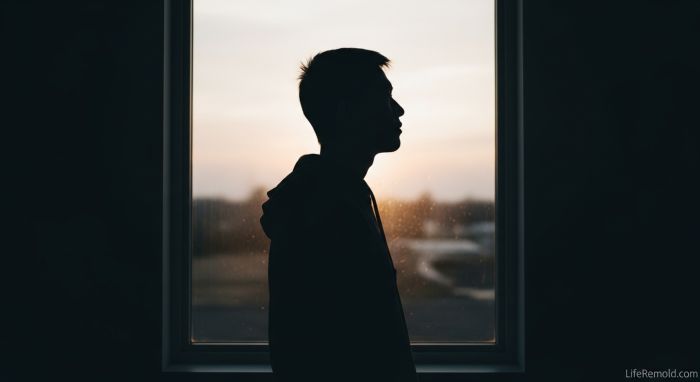 Person contemplating emotional barriers and fear of vulnerability