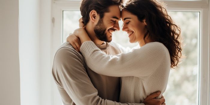 Couple embracing showing relationship transformation through combining sorry thanks please